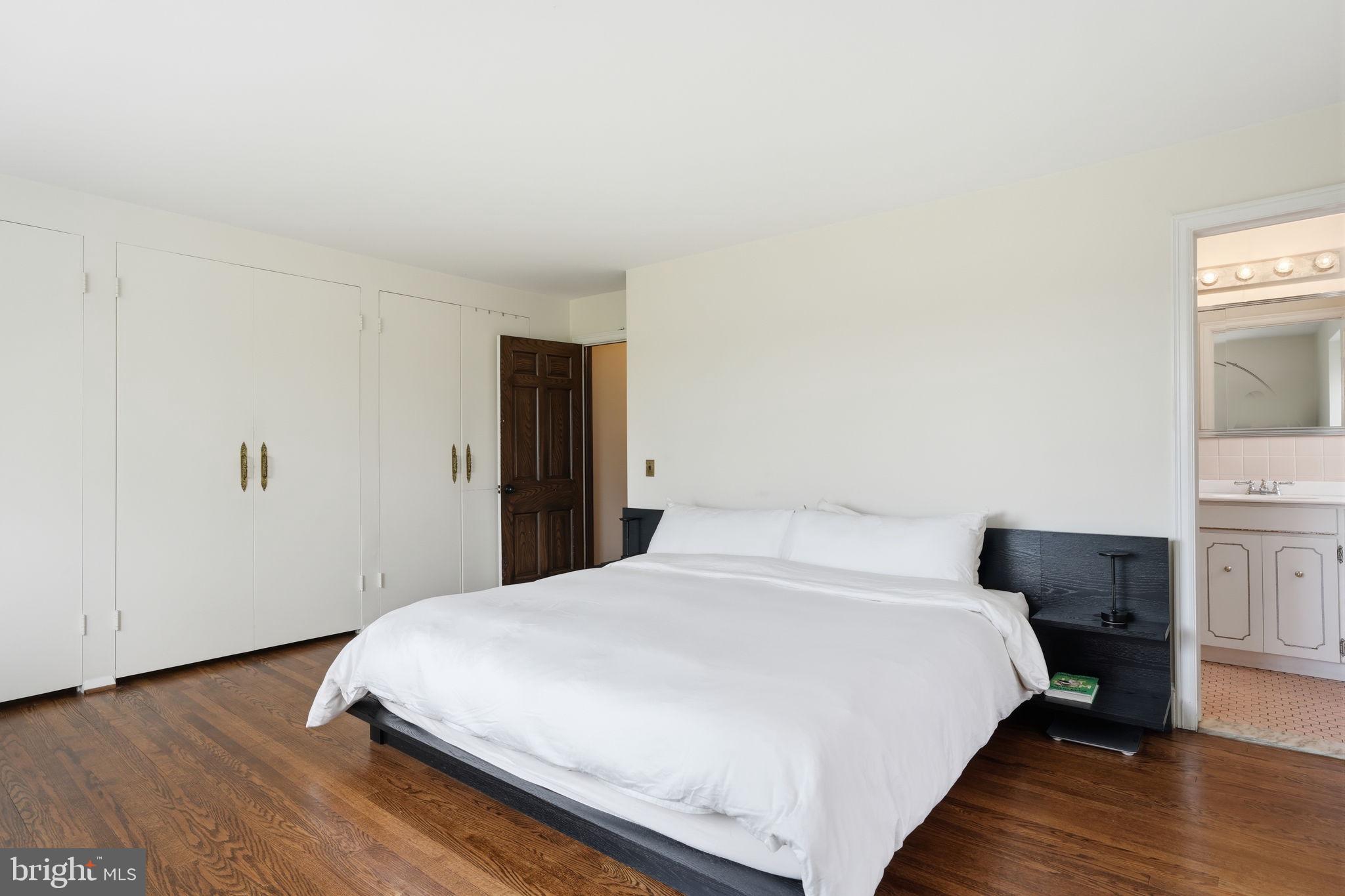 448 Moredon Road Huntingdon Valley, PA 19006 - Photo 21 of 66 a bedroom with a bed and a stove