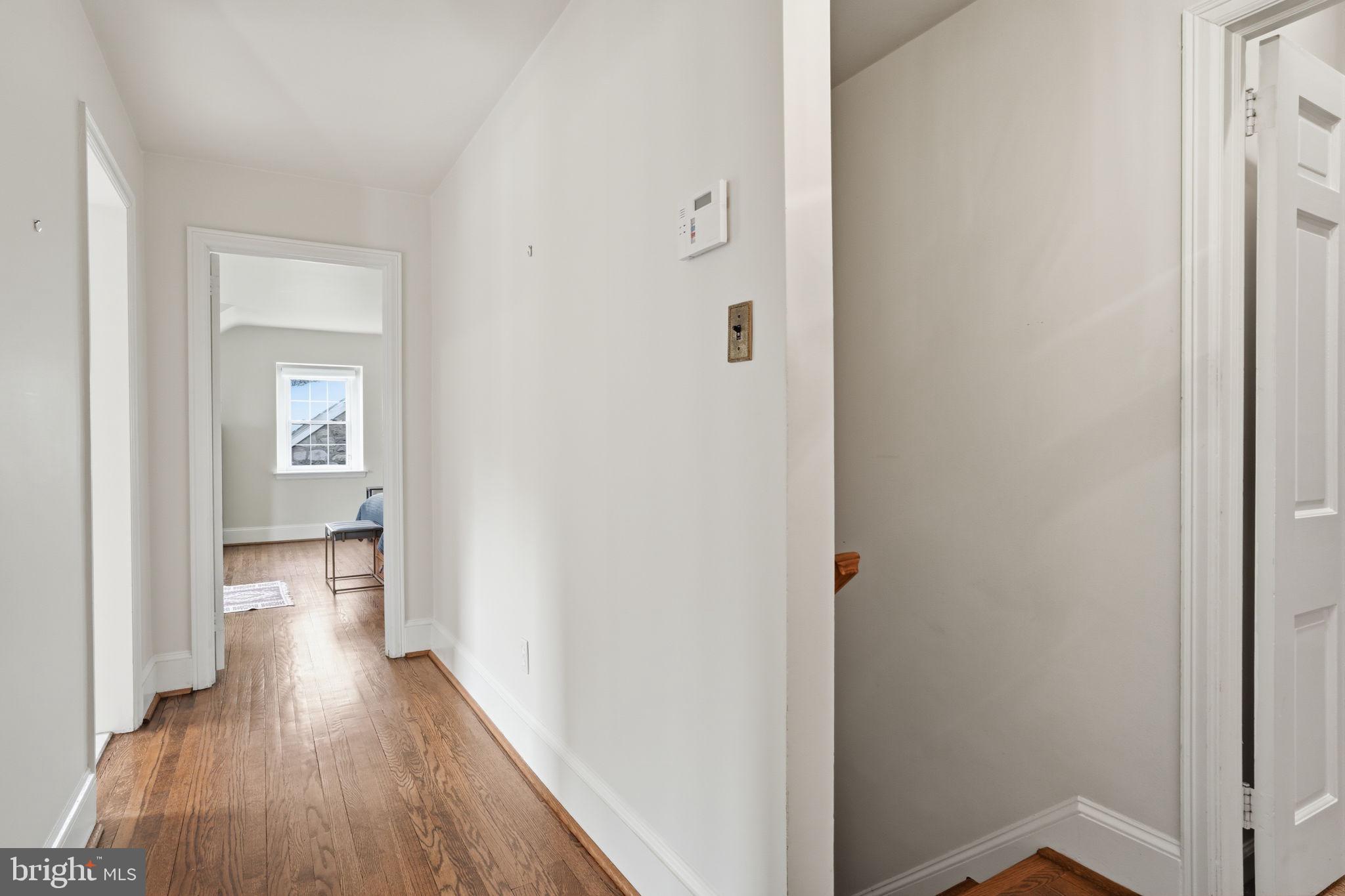 448 Moredon Road Huntingdon Valley, PA 19006 - Photo 26 of 66 a view of a hallway with wooden floor and closet
