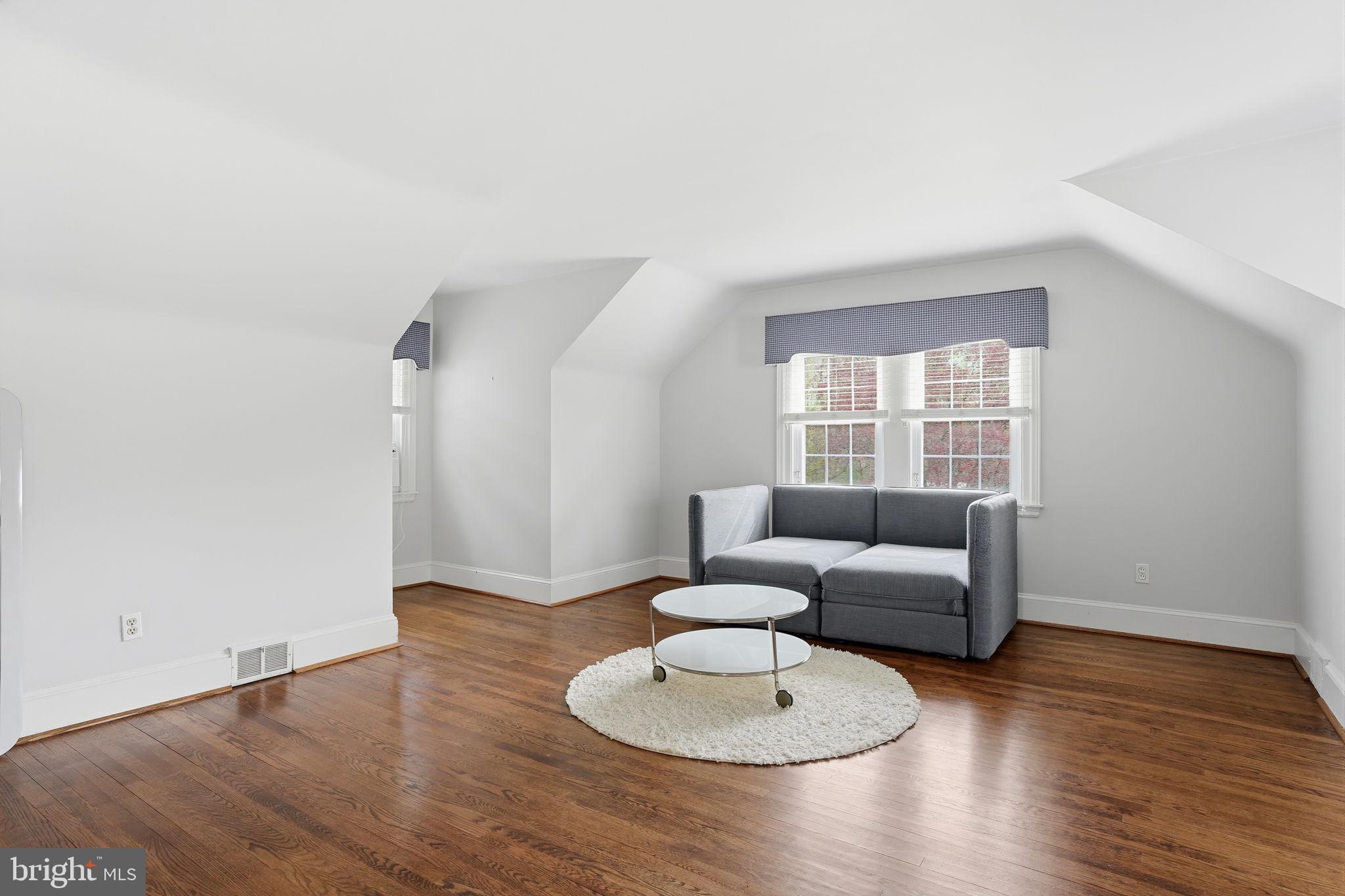 448 Moredon Road Huntingdon Valley, PA 19006 - Photo 27 of 66 a living room with furniture and a wooden floor
