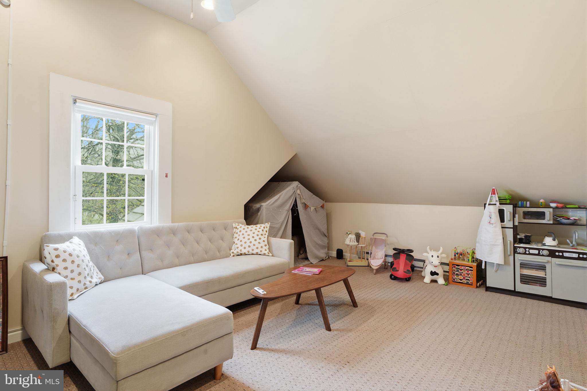 448 Moredon Road Huntingdon Valley, PA 19006 - Photo 30 of 66 a living room with furniture and a couch