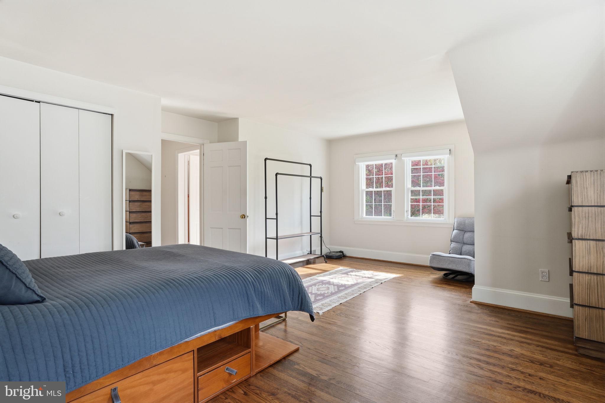 448 Moredon Road Huntingdon Valley, PA 19006 - Photo 32 of 66 a bedroom with a bed and wooden floor