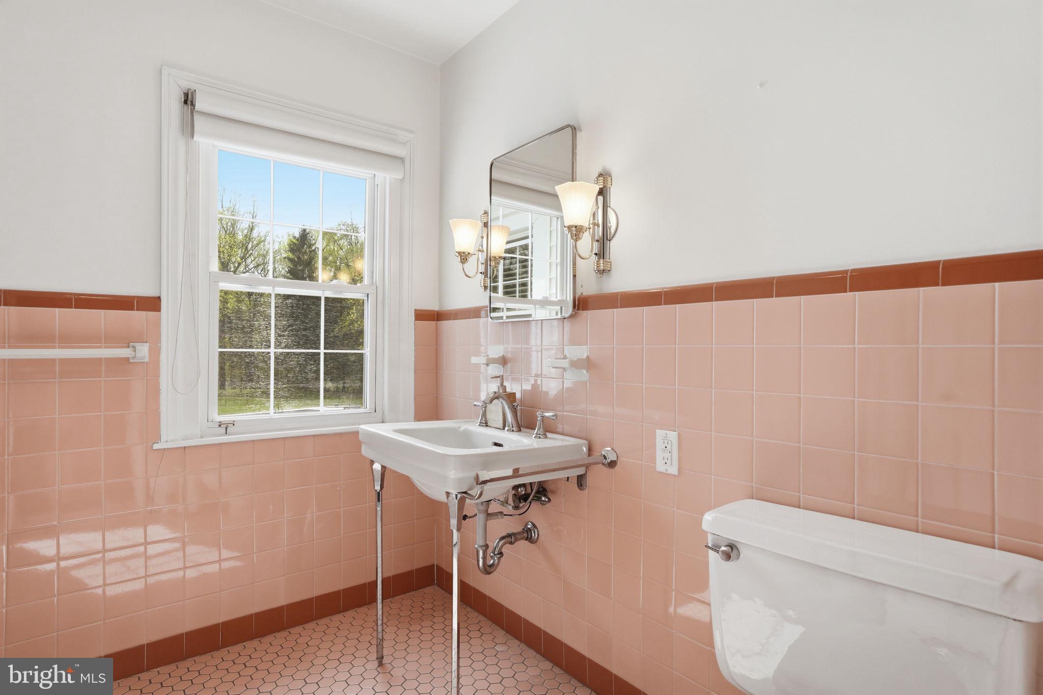 448 Moredon Road Huntingdon Valley, PA 19006 - Photo 35 of 66 a bathroom with a sink a toilet and a bathtub
