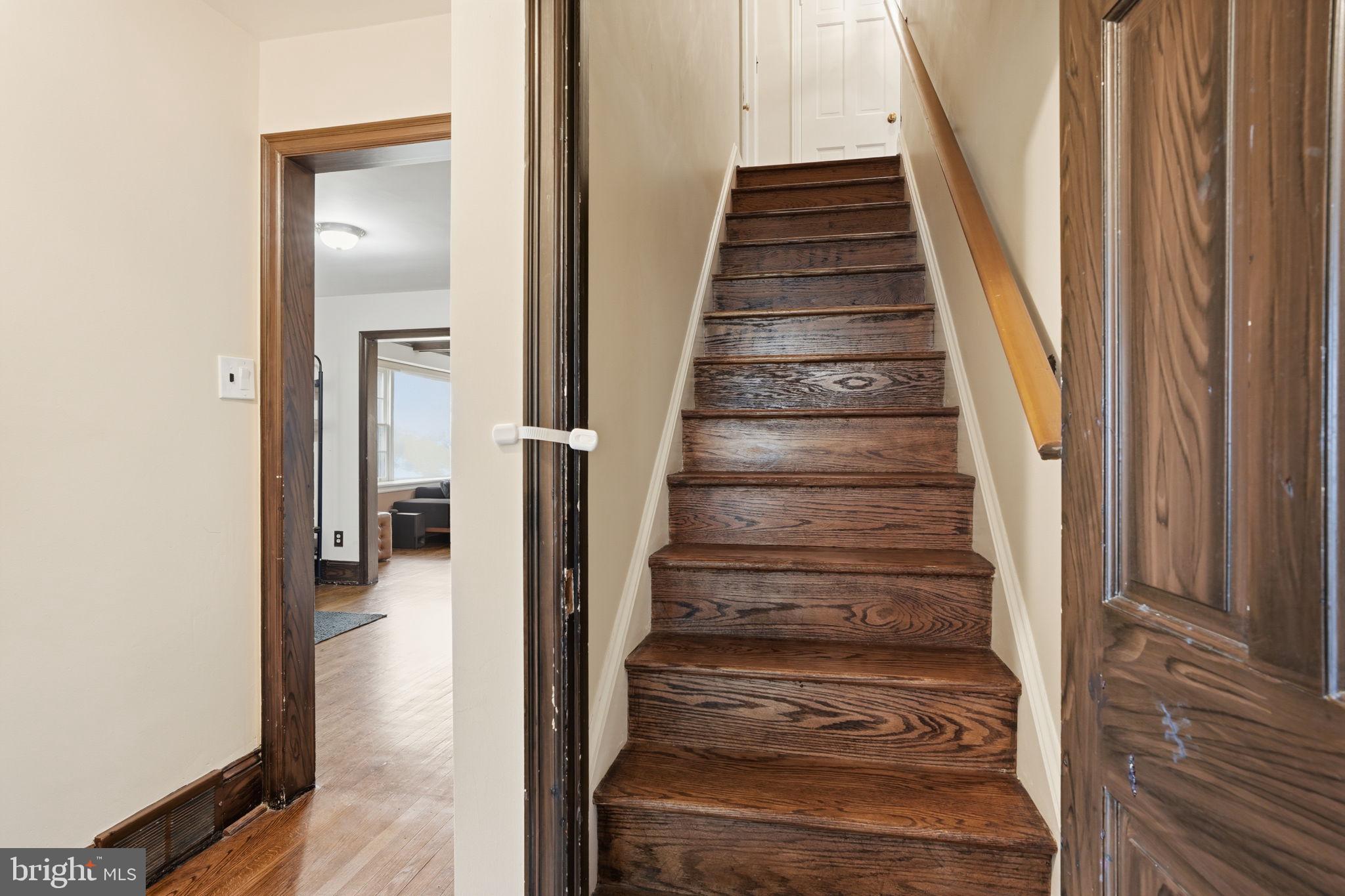 448 Moredon Road Huntingdon Valley, PA 19006 - Photo 36 of 66 a view of a hallway with wooden floor and entryway