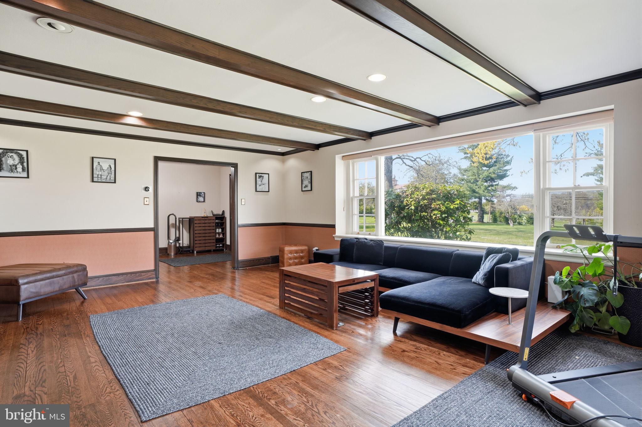 448 Moredon Road Huntingdon Valley, PA 19006 - Photo 42 of 66 a living room with furniture and a large window