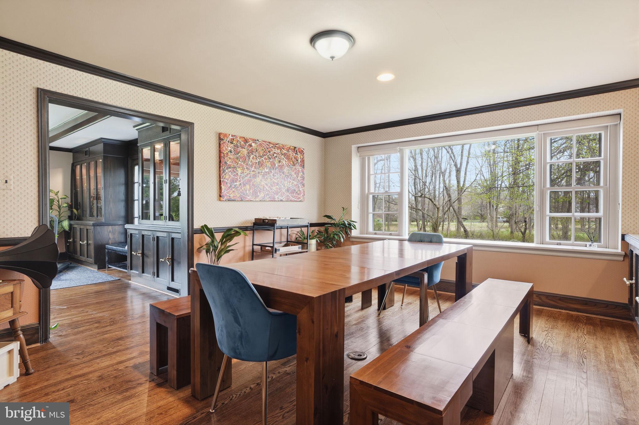 448 Moredon Road Huntingdon Valley, PA 19006 - Photo 42 of 66 a view of a dining room with furniture window and wooden floor