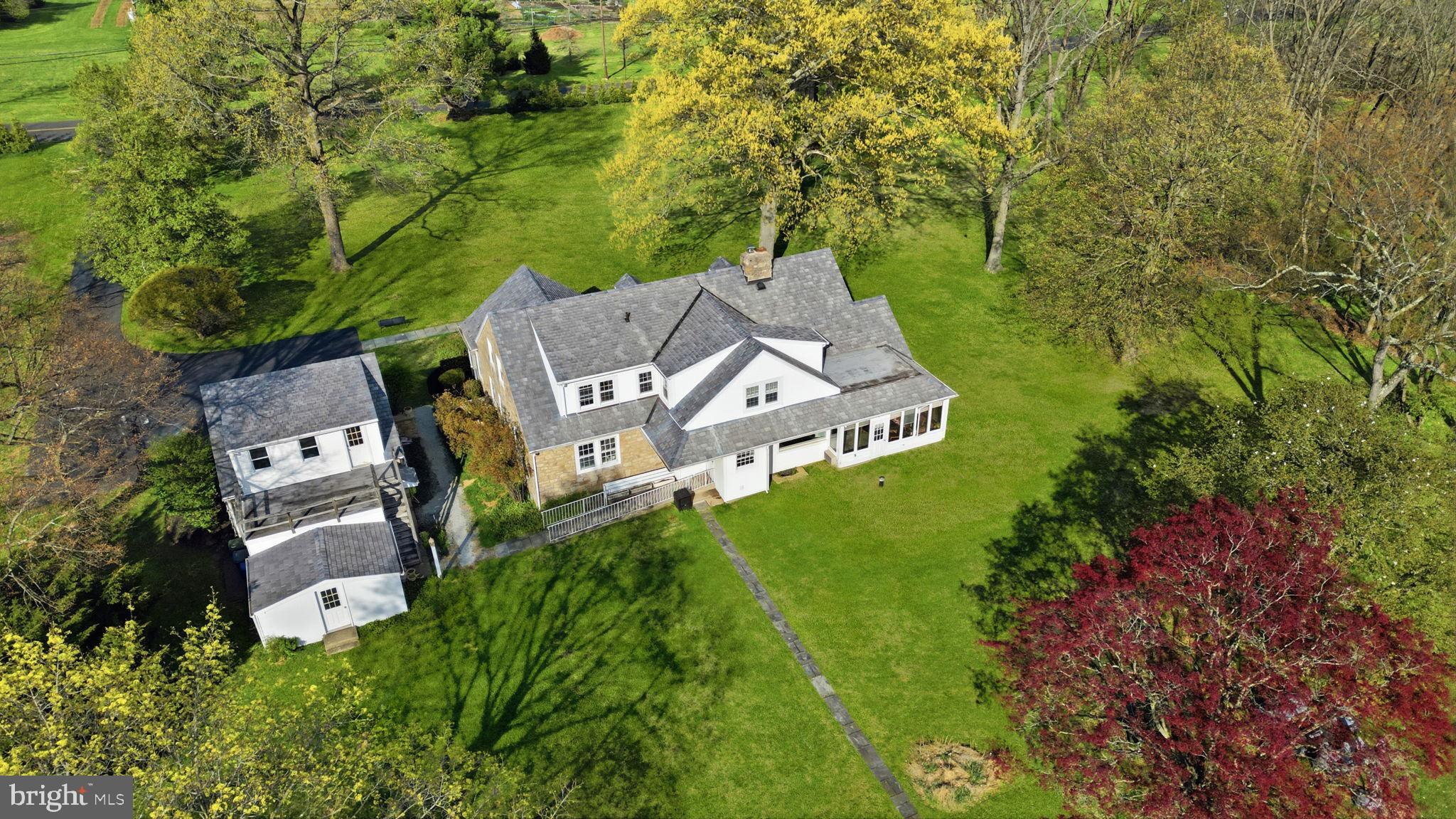 448 Moredon Road Huntingdon Valley, PA 19006 - Photo 50 of 66 an aerial view of a house with a yard
