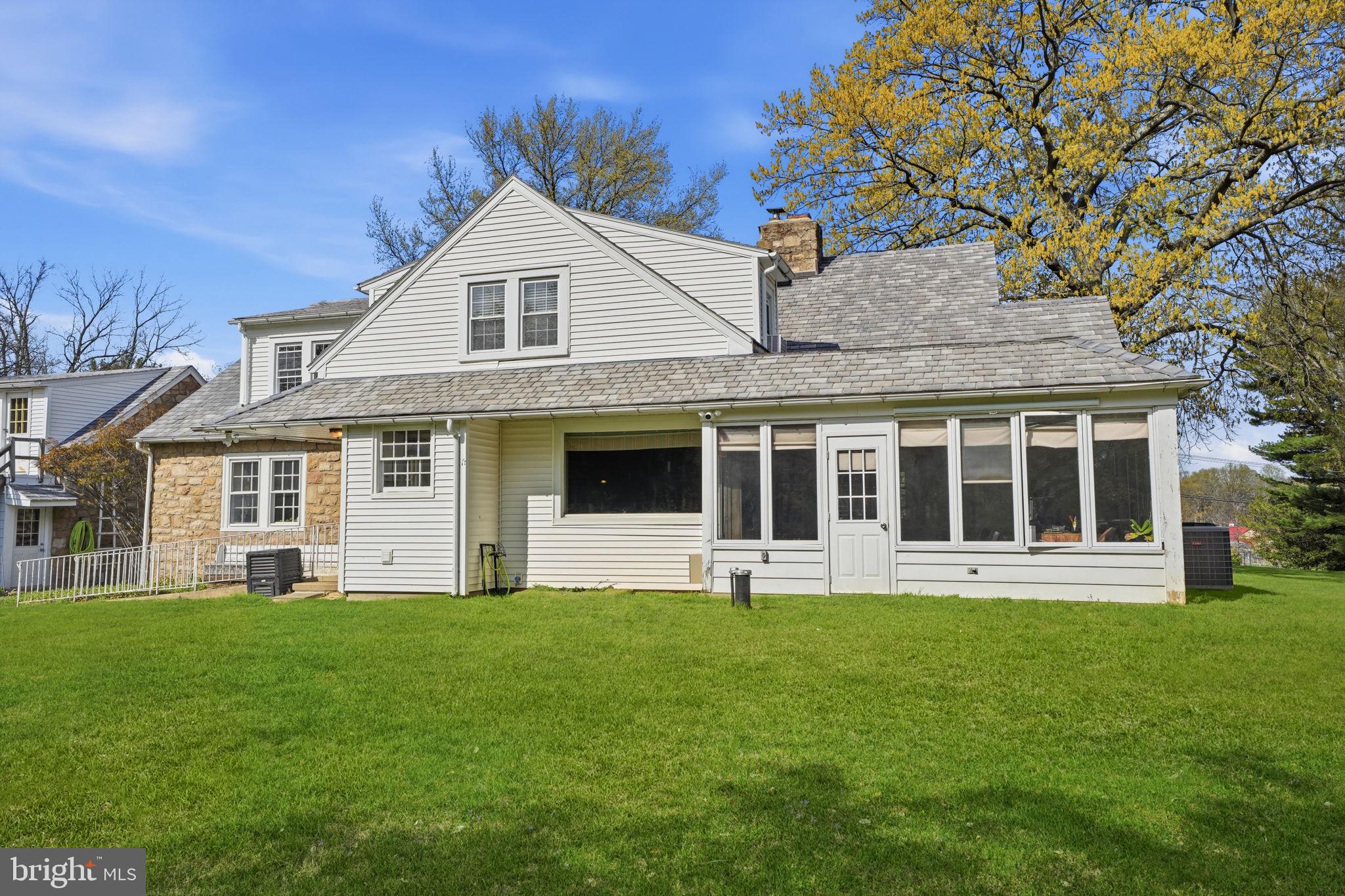 448 Moredon Road Huntingdon Valley, PA 19006 - Photo 57 of 66 a front view of a house with a yard