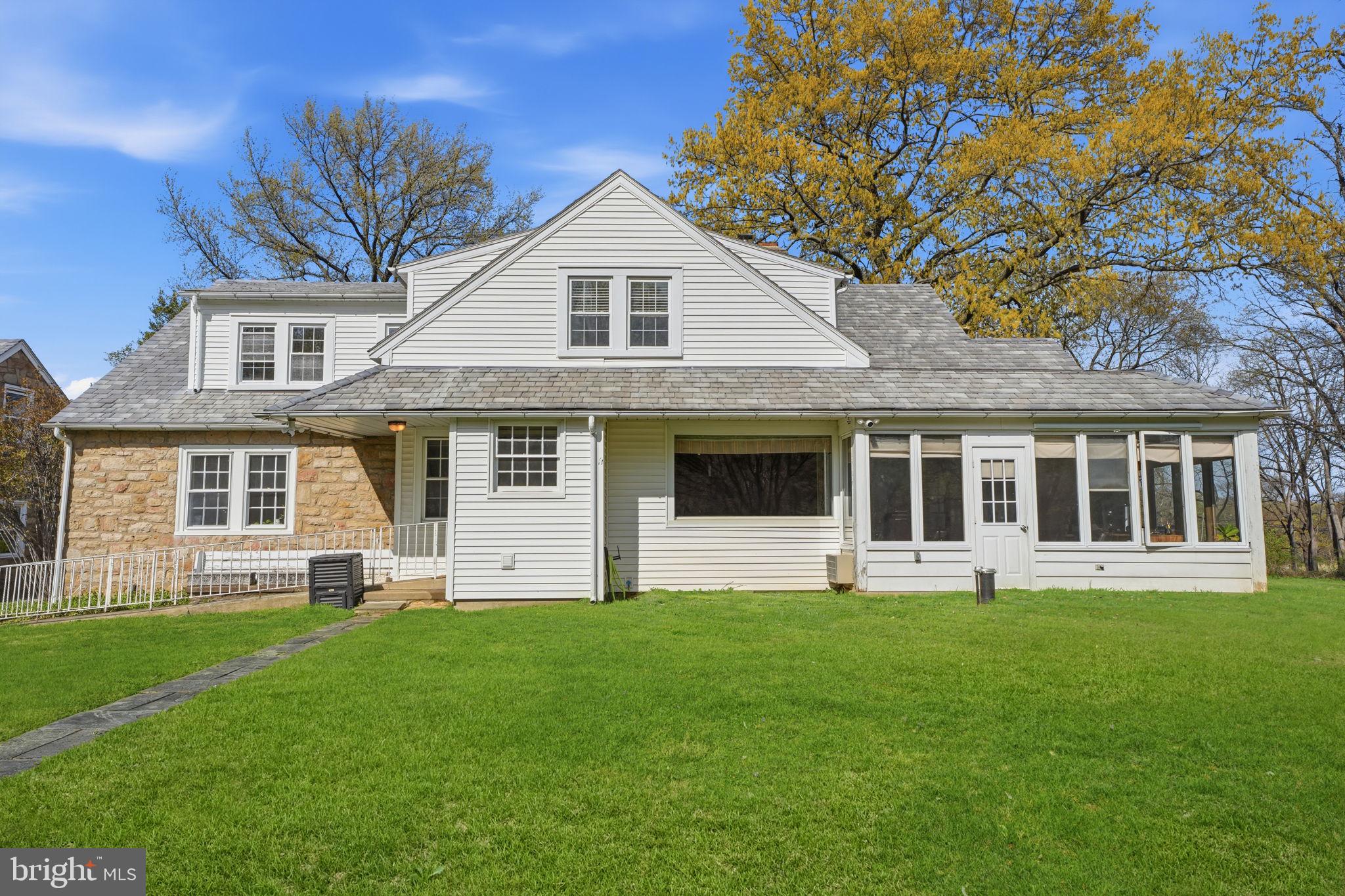 448 Moredon Road Huntingdon Valley, PA 19006 - Photo 58 of 66 a front view of a house with a yard