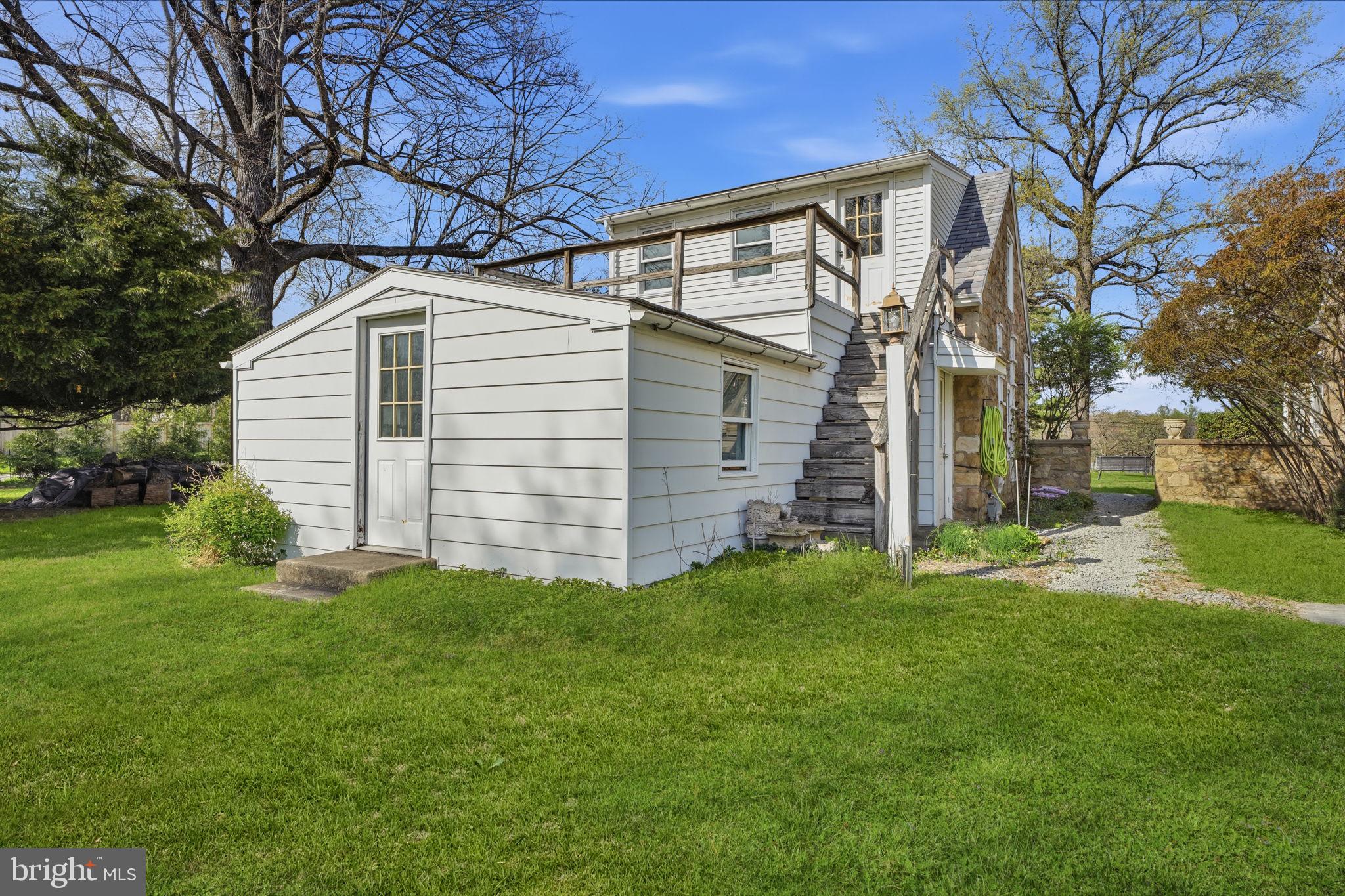 448 Moredon Road Huntingdon Valley, PA 19006 - Photo 61 of 66 a front view of a house with a yard