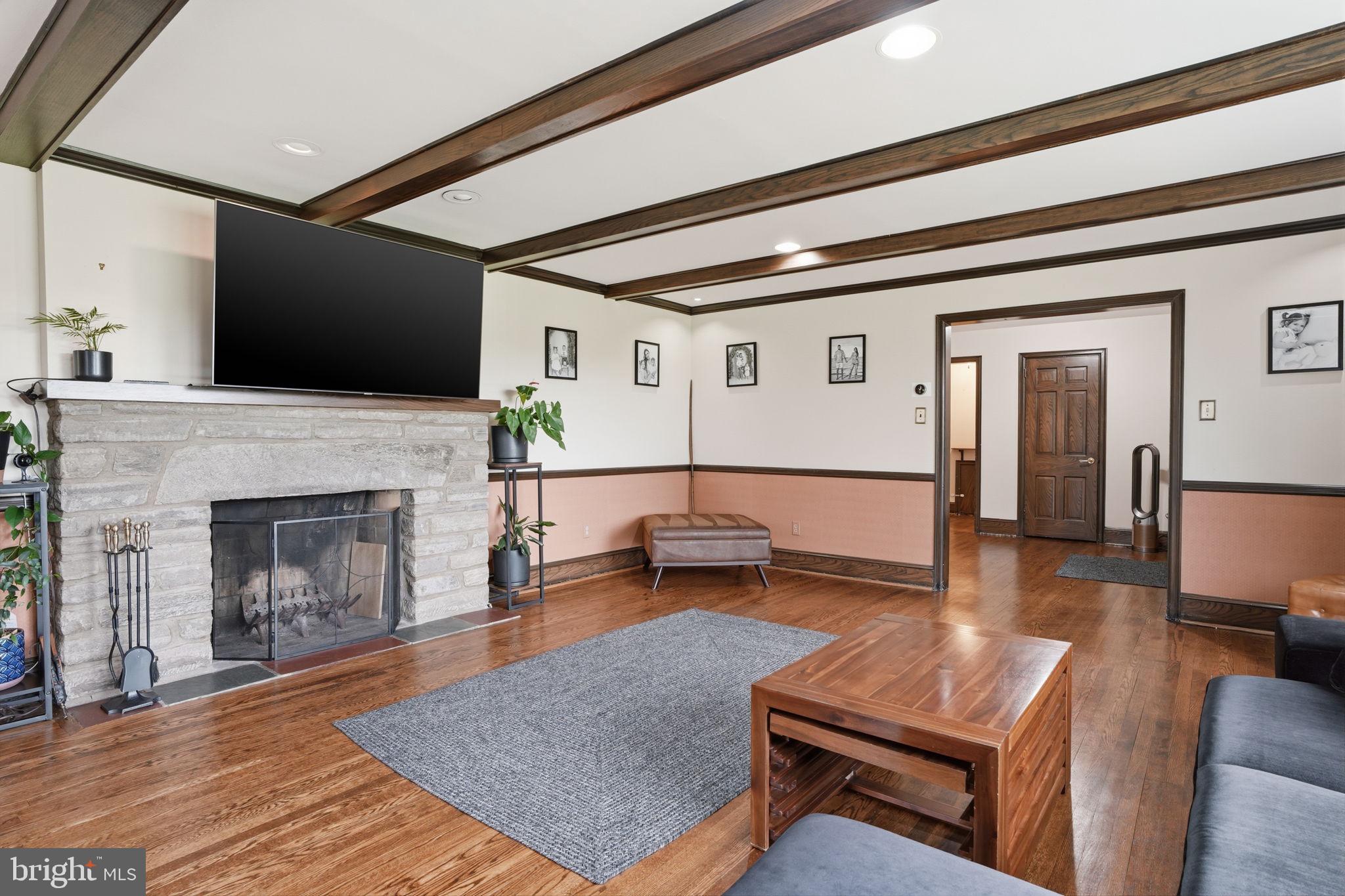 448 Moredon Road Huntingdon Valley, PA 19006 - Photo 8 of 66 a living room with furniture pool table and a fireplace