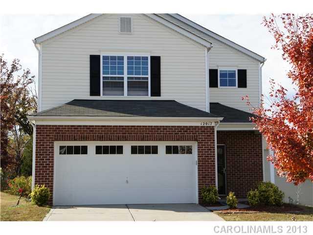 12017 Downy Birch Road Charlotte, NC 28227 - Photo 2 of 16 a front view of a house with windows