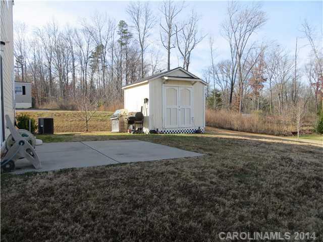 12017 Downy Birch Road Charlotte, NC 28227 - Photo 16 of 16 a front view of a house with a yard