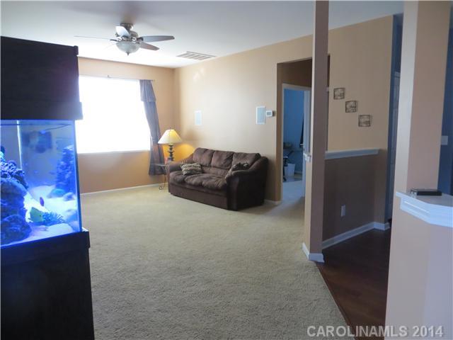 12017 Downy Birch Road Charlotte, NC 28227 - Photo 6 of 16 a living room with furniture