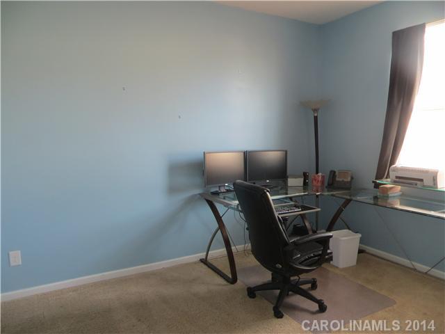 12017 Downy Birch Road Charlotte, NC 28227 - Photo 10 of 16 a workspace with furniture and a window