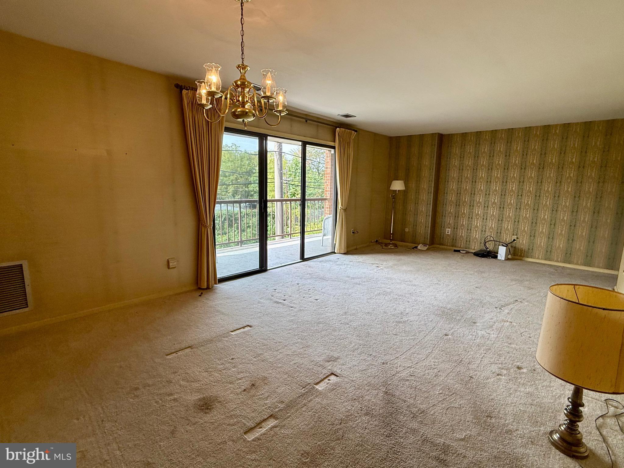 203 Haddonfield Commons Haddonfield, NJ 08033 - Photo 12 of 19 a view of an empty room with a window