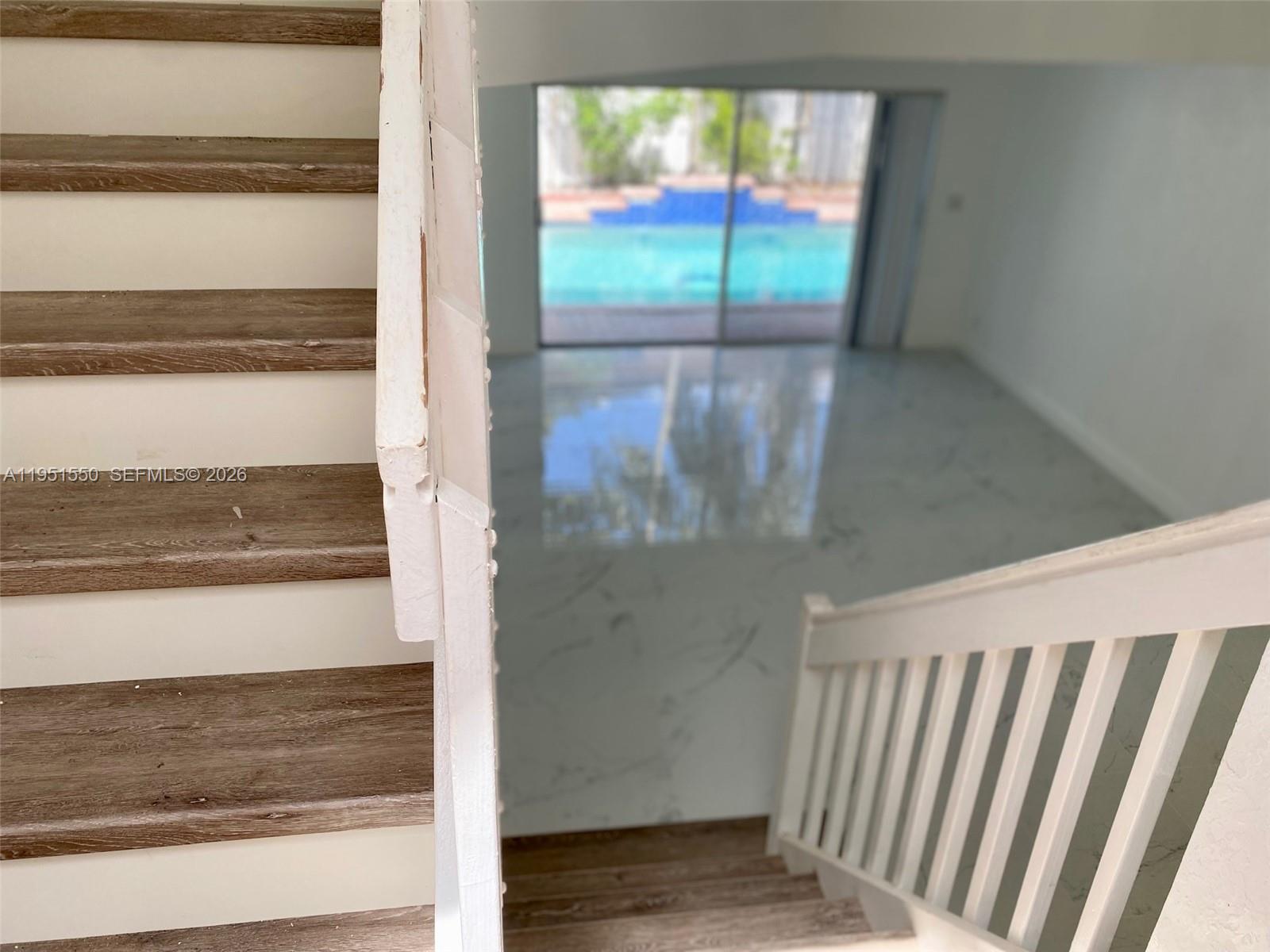 11301 Rockinghorse Road Cooper City, FL 33026 - Photo 11 of 34 a view of a glass door