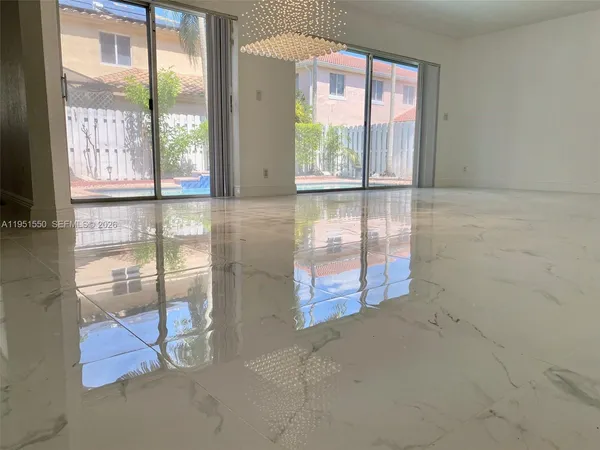 a bathroom with a bathtub and a sink