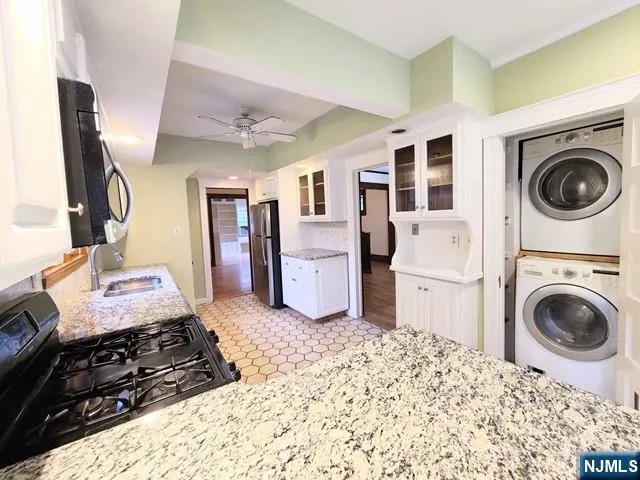 a bed room with a bed and a stove