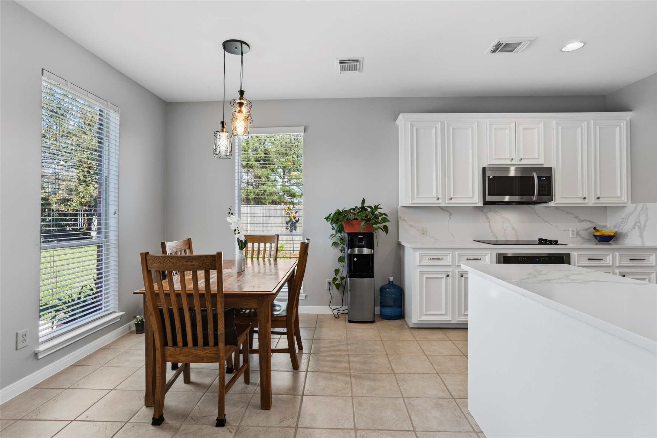 1131 Windsor Chase Lane Spring, TX 77373 - Photo 11 of 39 a dining room with furniture and window