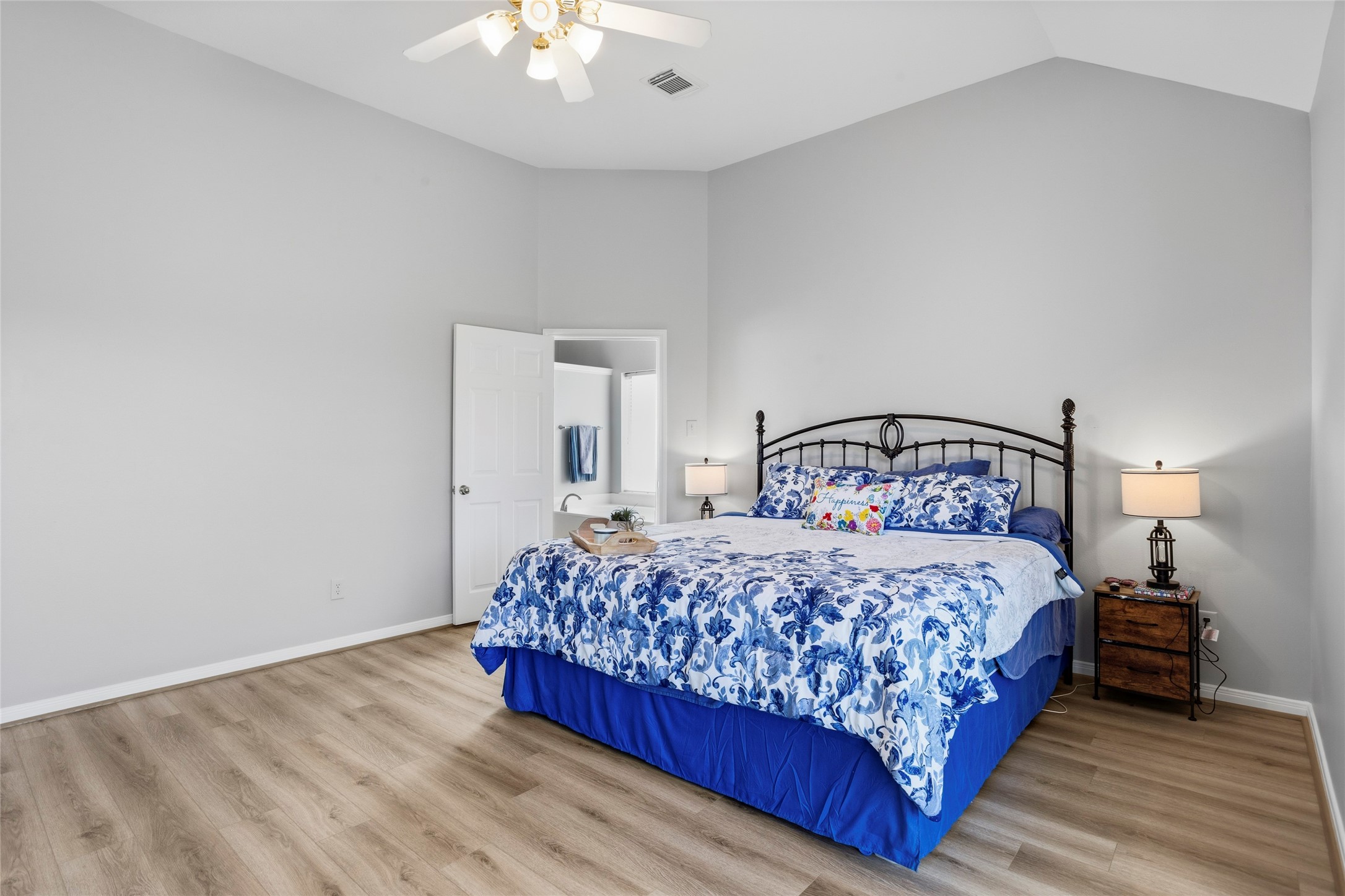1131 Windsor Chase Lane Spring, TX 77373 - Photo 14 of 39 a bedroom with a bed and a mirror