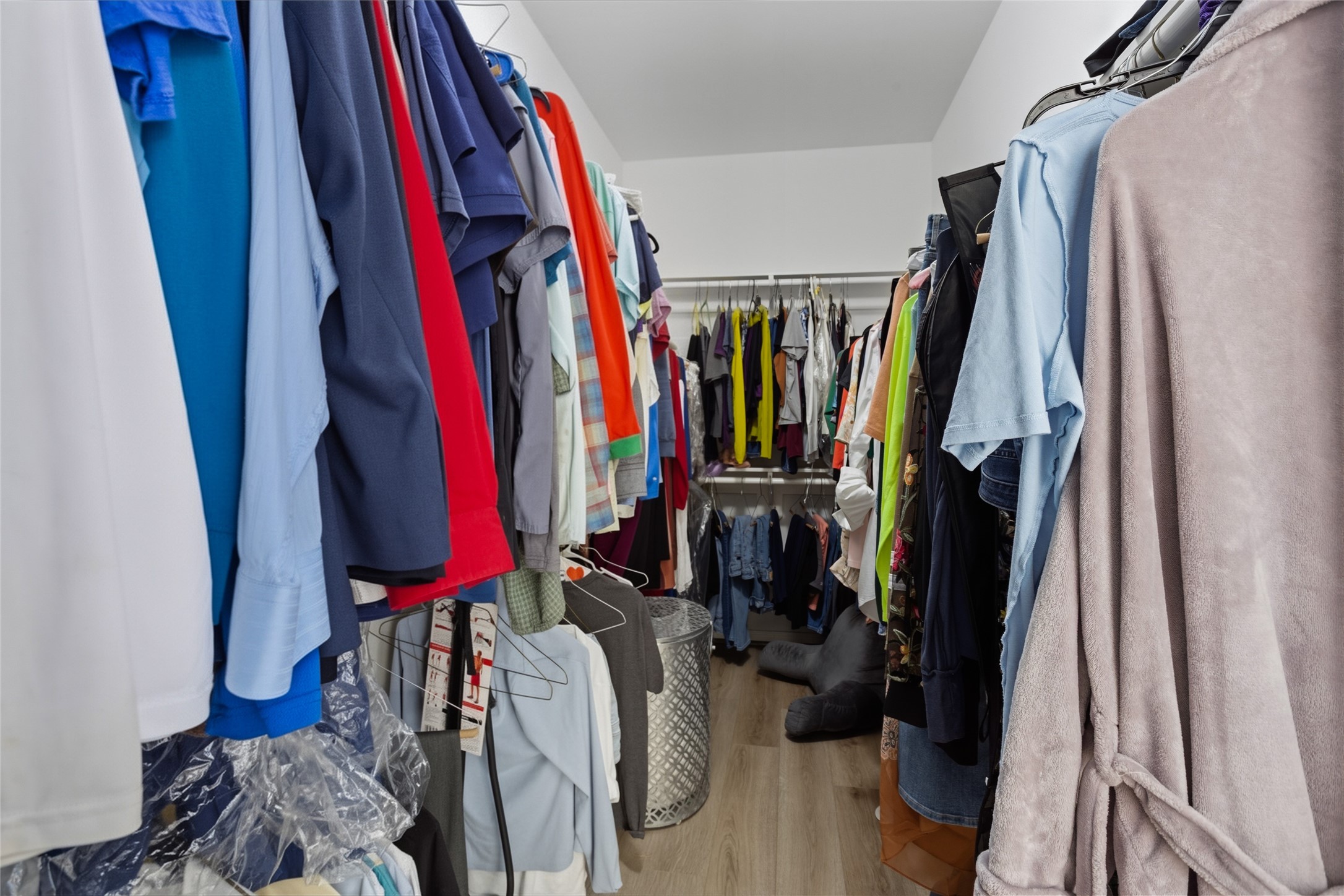 1131 Windsor Chase Lane Spring, TX 77373 - Photo 19 of 39 a view of walk in closet with clothes
