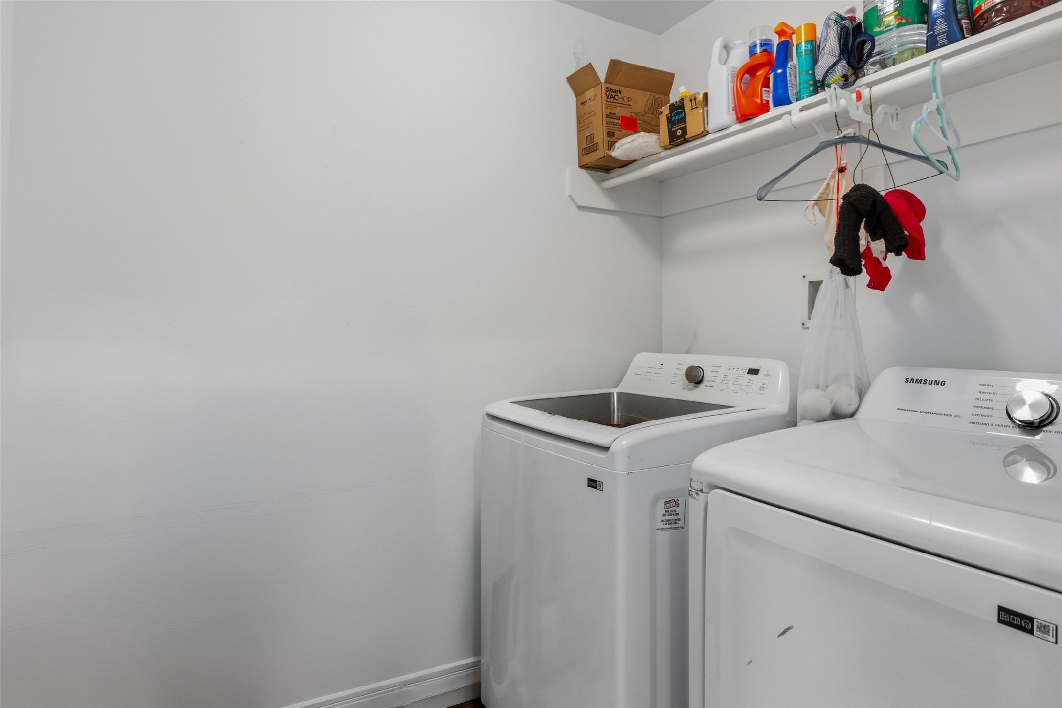 1131 Windsor Chase Lane Spring, TX 77373 - Photo 22 of 39 a utility room with dryer and washer