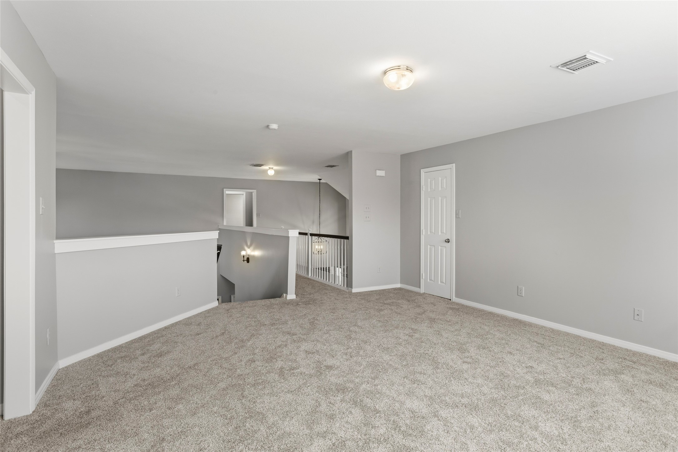 1131 Windsor Chase Lane Spring, TX 77373 - Photo 26 of 39 a view of empty room with a kitchen