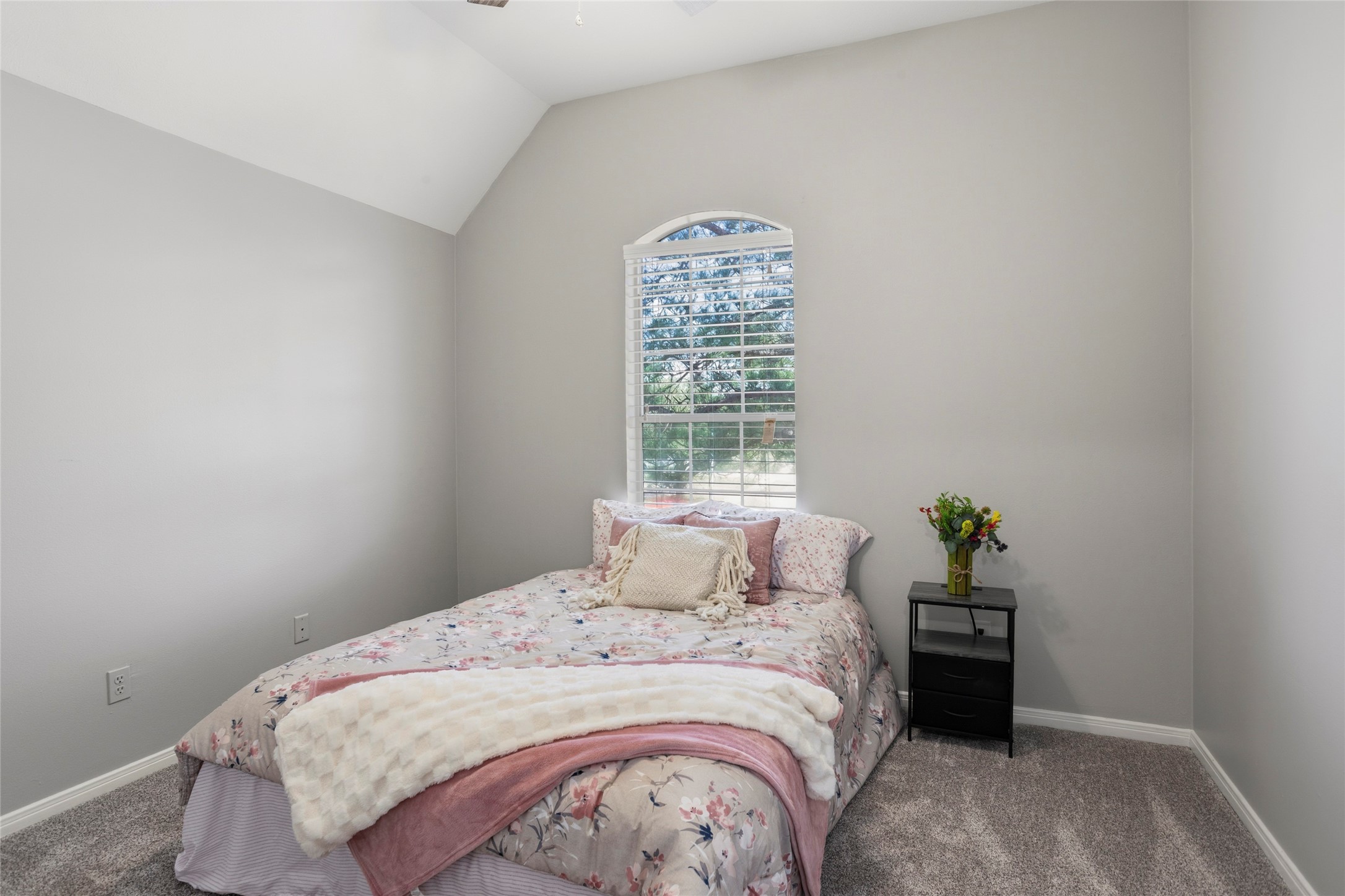 1131 Windsor Chase Lane Spring, TX 77373 - Photo 29 of 39 a bedroom with a bed and a window