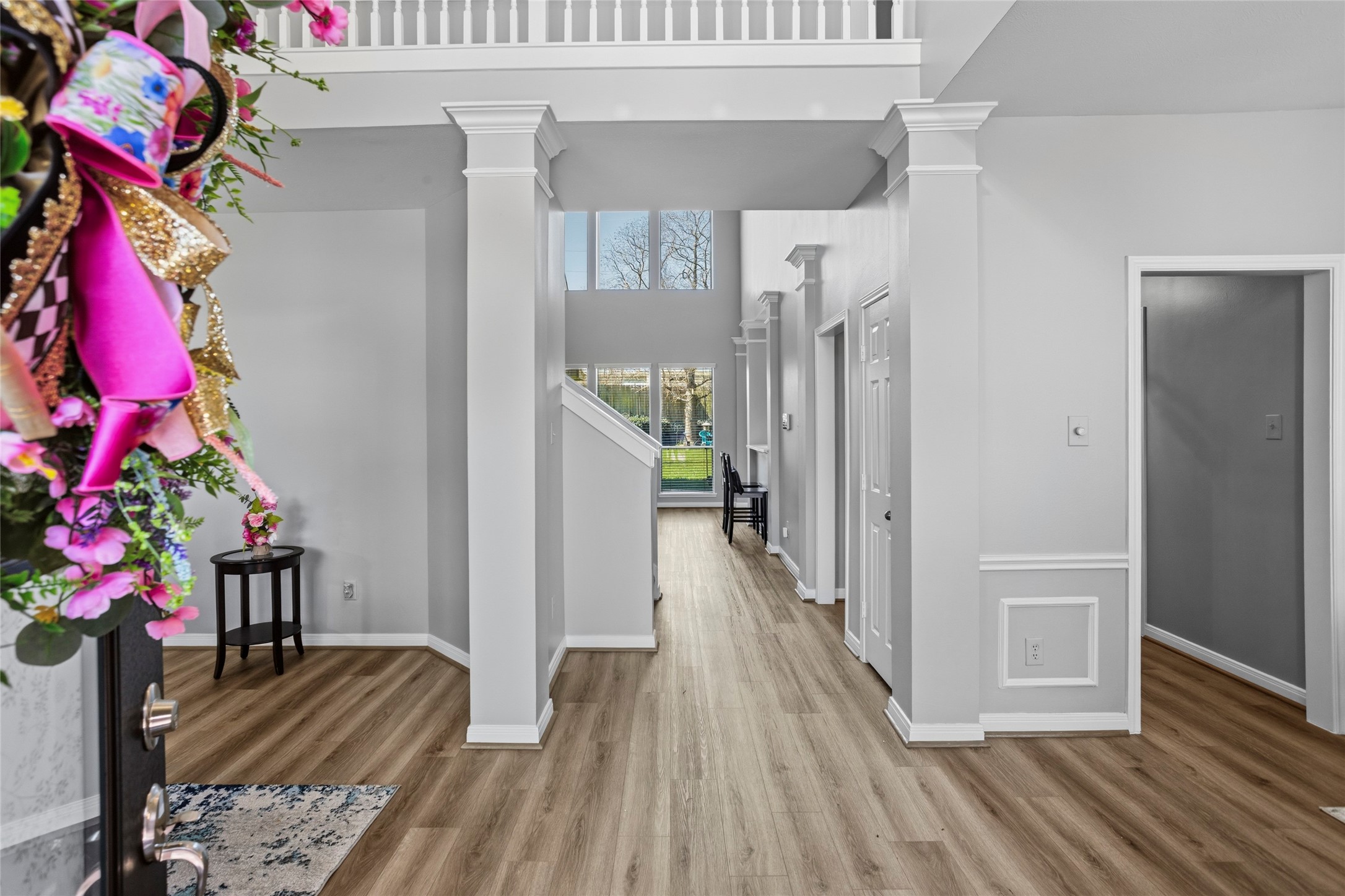 1131 Windsor Chase Lane Spring, TX 77373 - Photo 3 of 39 a view of entryway with wooden floor