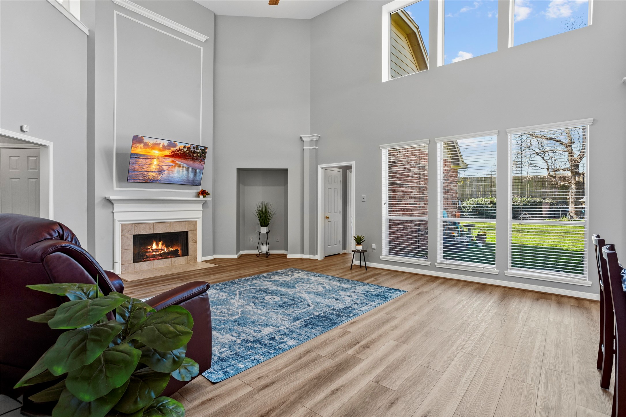1131 Windsor Chase Lane Spring, TX 77373 - Photo 5 of 39 a living room with furniture and a fireplace