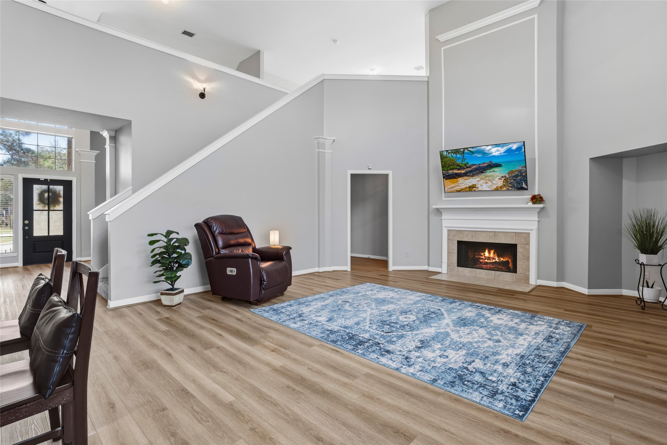 1131 Windsor Chase Lane Spring, TX 77373 - Photo 6 of 39 a living room with furniture a fireplace and rug