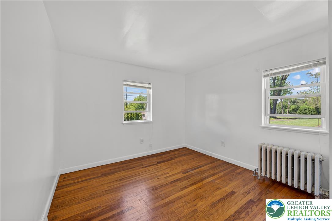 1411 Lieb Road Easton, PA 18040 - Photo 28 of 46 Hardwood floors and natural light from two windows enhance this inviting bedroom.