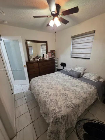 a living room with rug