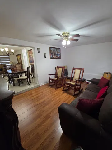 a kitchen with a stove and a refrigerator