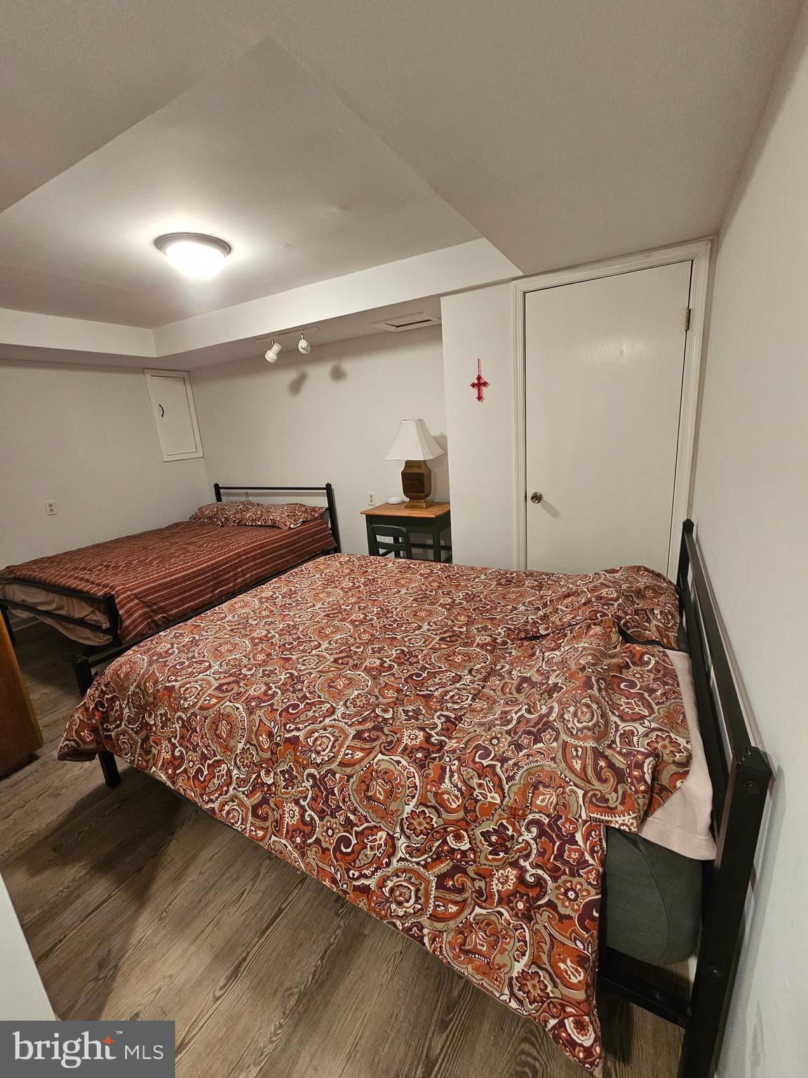 82 Basin Road Earleville, MD 21919 - Photo 13 of 46 a large bed sitting in a bedroom next to a window