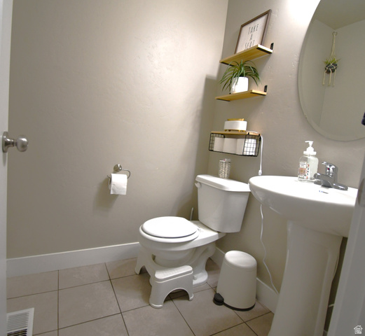 1688 West 200 North Mapleton, UT 84664 - Photo 7 of 18 Half bath featuring baseboards and light tile patterned floors