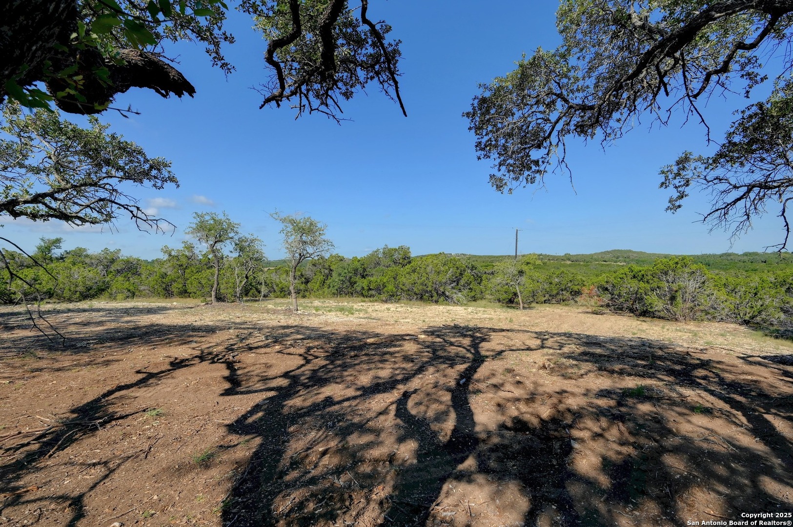 Tract 2 Pierson Road Blanco, TX 78606 - Photo 11 of 13 a view of a road with an ocean view