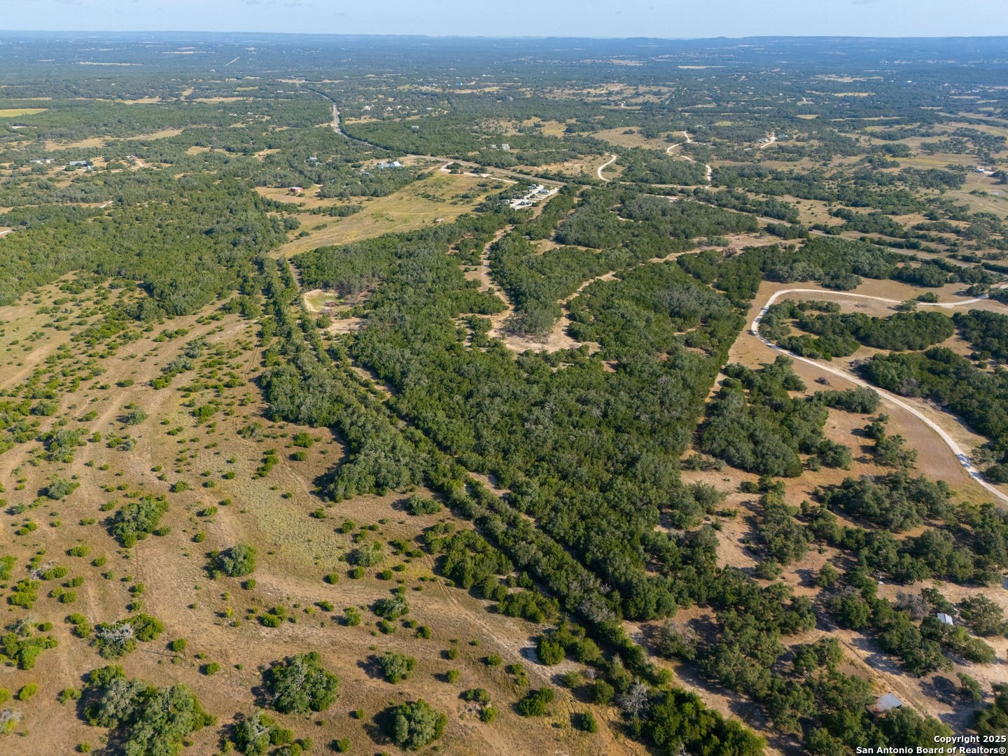 Tract 2 Pierson Road Blanco, TX 78606 - Photo 5 of 13 an aerial view of residential houses with outdoor space and trees
