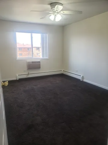 a kitchen with stainless steel appliances a refrigerator and a stove