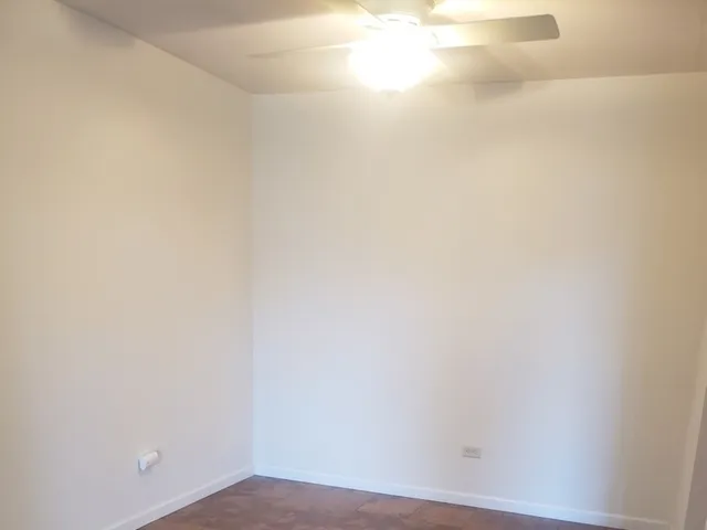 a view of small space with wooden floor