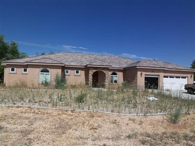 14280 Rincon Road Apple Valley, CA 92307 - Photo 1 of 1 front view of a house with a dry yard