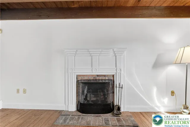 a living room with a fireplace