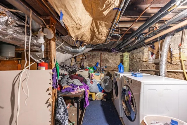 a room with gym equipment and a flat screen tv