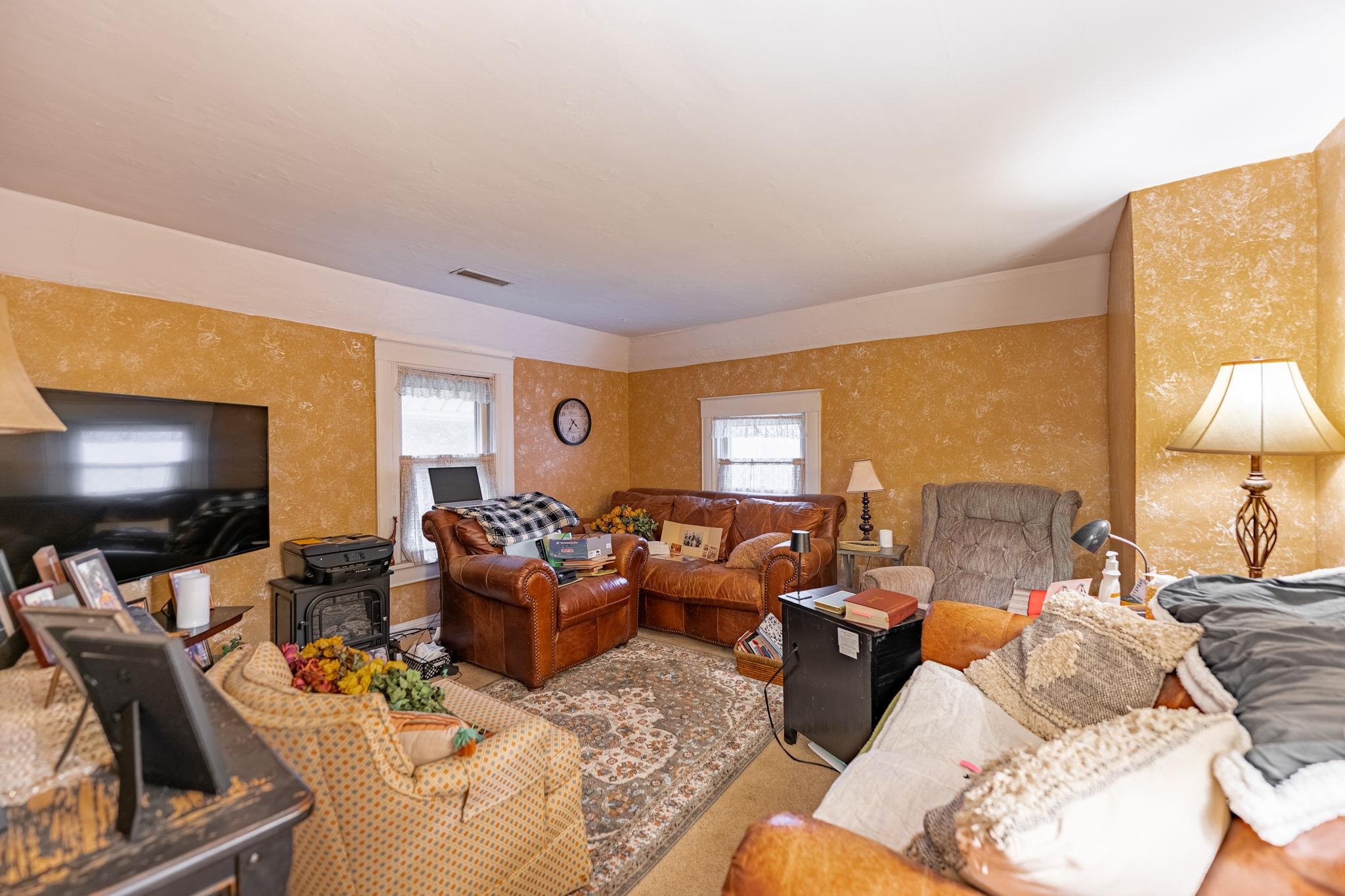 917 West Locust Street Belvidere, IL 61008 - Photo 15 of 59 a living room with furniture flat screen tv and lamp