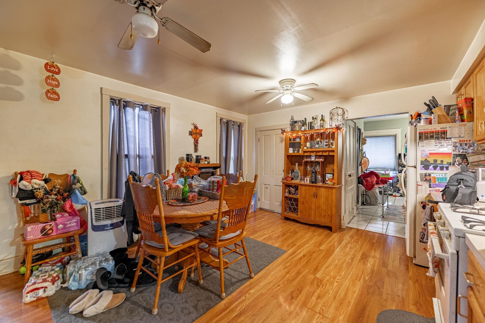 917 West Locust Street Belvidere, IL 61008 - Photo 8 of 59 a dining room with furniture entryway and wooden floor