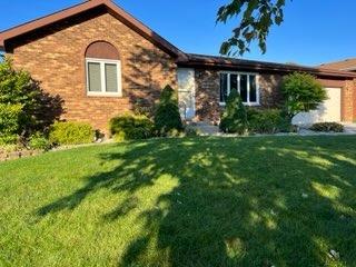 2433 Flat Rock Road Dyer, IN 46311 - Photo 1 of 17 a front view of a house with a yard