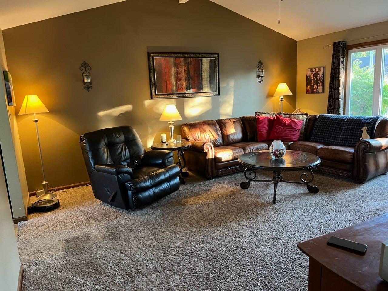 2433 Flat Rock Road Dyer, IN 46311 - Photo 2 of 17 a living room with furniture a lamp and a potted plant