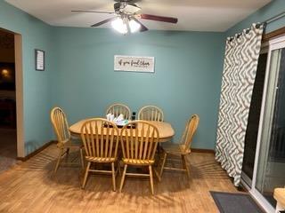 2433 Flat Rock Road Dyer, IN 46311 - Photo 3 of 17 a view of a dining room with furniture window and wooden floor