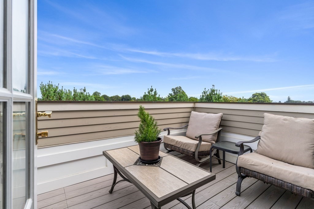 39 Intrepid Circle, Unit 302 Marblehead, MA 01945 - Photo 24 of 32 a view of a outdoor space with lounge chair