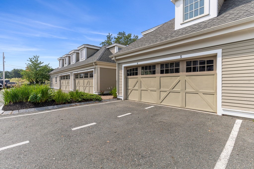 39 Intrepid Circle, Unit 302 Marblehead, MA 01945 - Photo 32 of 32 a view of a house with a street